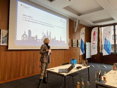 Begrüßung durch Sabine Maass, Leiterin des Referats für Industrieforschung für Unternehmen, Innovationsberatung im BMWK